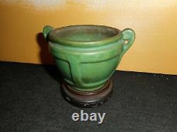 Antique signed Arts and Crafts small green pottery vase on stand