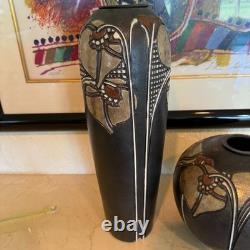 Pair of Studio art pottery vases created by the artist Amil