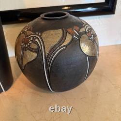 Pair of Studio art pottery vases created by the artist Amil