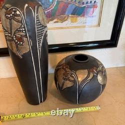 Pair of Studio art pottery vases created by the artist Amil