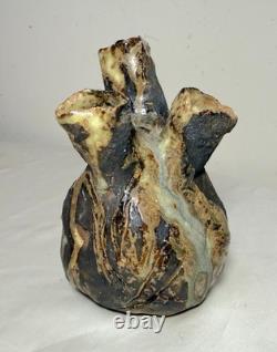 Vintage handmade brutalist American pottery anatomical heart shaped vase