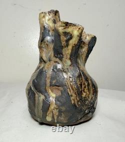 Vintage handmade brutalist American pottery anatomical heart shaped vase