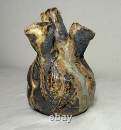 Vintage handmade brutalist American pottery anatomical heart shaped vase