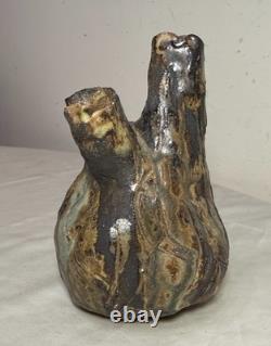 Vintage handmade brutalist American pottery anatomical heart shaped vase