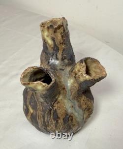 Vintage handmade brutalist American pottery anatomical heart shaped vase