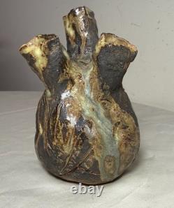 Vintage handmade brutalist American pottery anatomical heart shaped vase