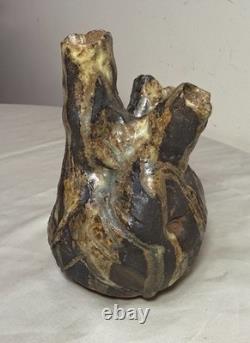 Vintage handmade brutalist American pottery anatomical heart shaped vase