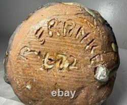 Vintage handmade brutalist American pottery anatomical heart shaped vase